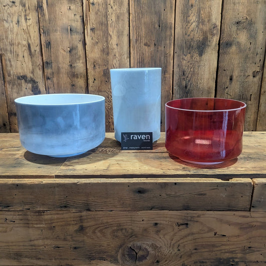 Three Crystal Tones crystal singing bowls displayed with a Raven Sounds card