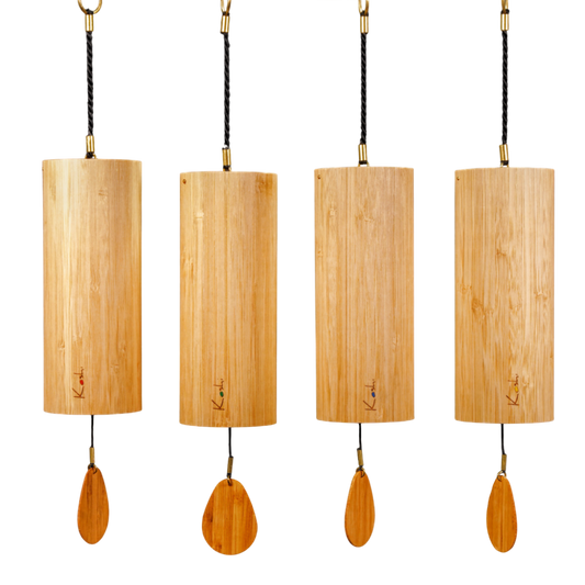 Set of four Koshi chimes — Terra, Aqua, Aria, and Ignis — hanging in a row