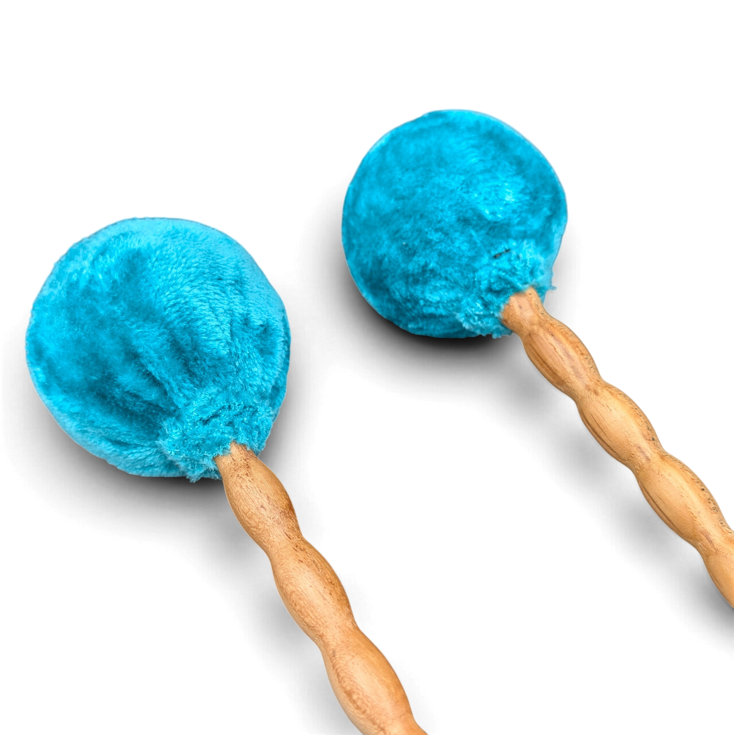 Grotta Sonora roller mallet pair – turquoise faux-fur heads close-up