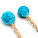 Grotta Sonora roller mallet pair – turquoise faux-fur heads close-up
