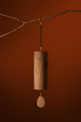 Koshi Earth Symphony Mountain chime hanging from a branch