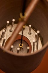 Inside the Koshi Earth Symphony Mountain chime, showing the twelve tuned steel strings