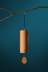 Koshi Earth Symphony River chime hanging from a branch